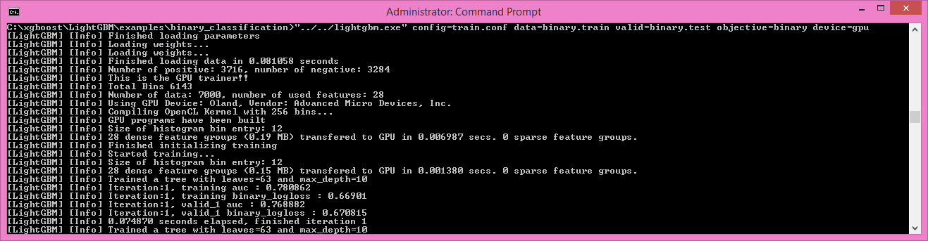 A screenshot of the command prompt where a binary classification model is being trained using Light G B M.
